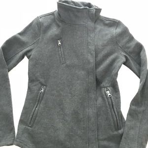 Fitted dark grey jacket.